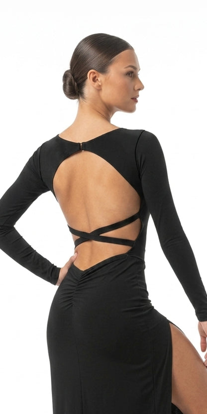 Ballroom dress with long open back and slit - rear view, approximately half-turned